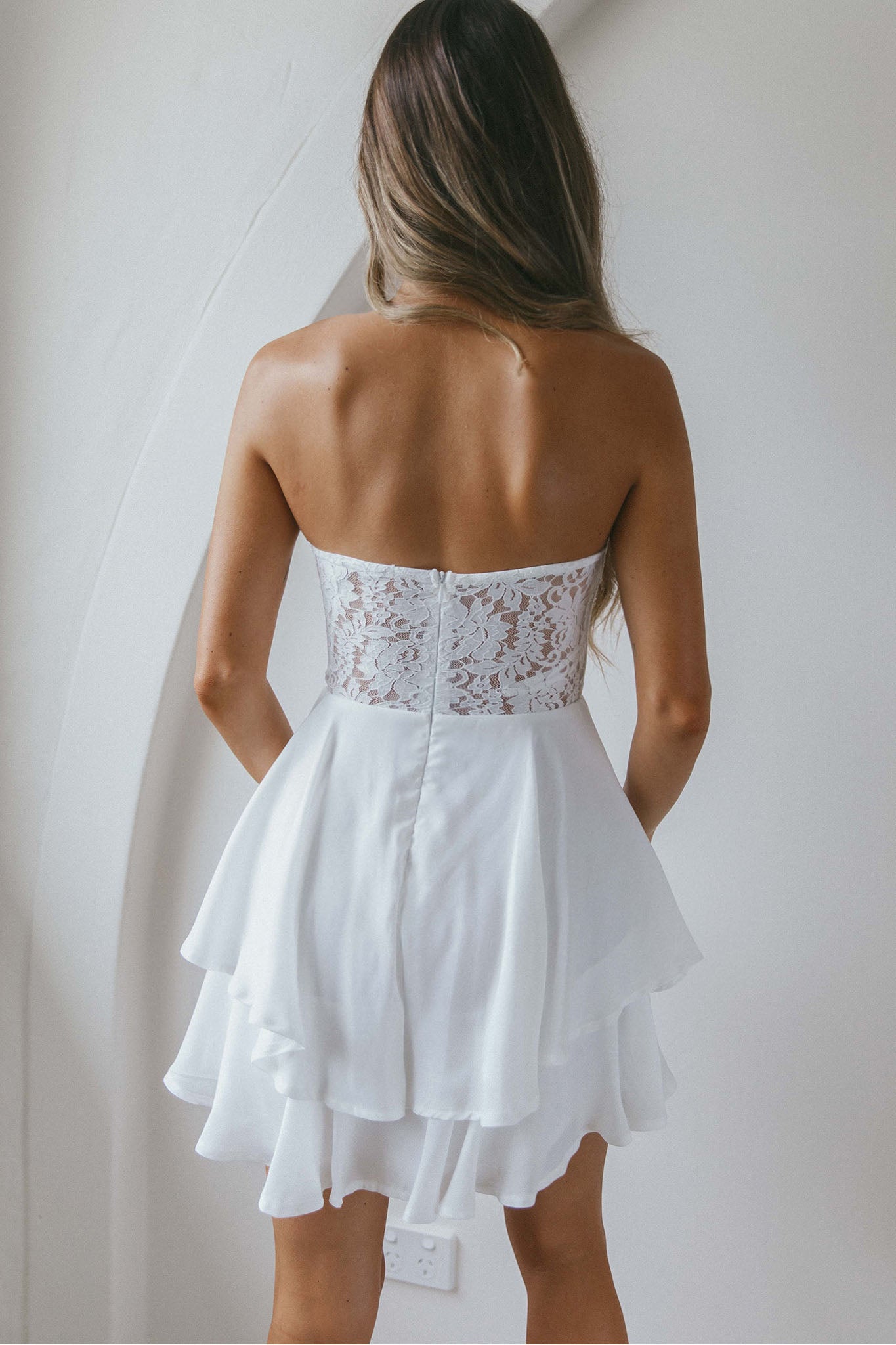 In Your Arms Strapless Lace Bodice Layered Hem Mini Dress White